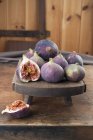 Fresh figs on wooden board — Stock Photo