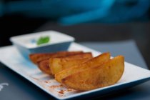 Жареный картофель клинья — стоковое фото