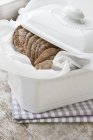 Rye crackers in white backing pan — Stock Photo