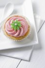 Cupcake topped with icing — Stock Photo