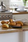 Potatoes on kitchen tabletop — Stock Photo