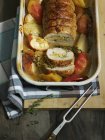 Rolled roast turkey with apples — Stock Photo