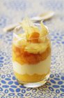 Layered dessert of apricots — Stock Photo