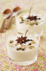 Panna cotta with spices in glasses — Stock Photo