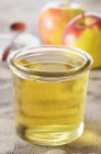 Glass jar of apple jelly — Stock Photo