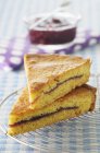 Almond cake with cherry jam — Stock Photo