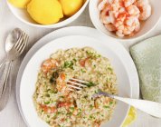 Risotto with prawns on plate — Stock Photo