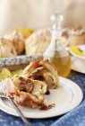 Closeup view of apple dumpling stuffed with dried fruit and topped with caramel sauce — Stock Photo
