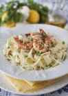 Tagliatelle ribbon pasta with prawns — Stock Photo