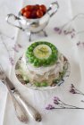 Chicken Aspic with Green Peas and Egg on tablecloth — Stock Photo