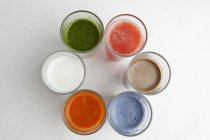 Assorted smoothies in glasses — Stock Photo