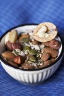 Nuts and seeds in bowl — Stock Photo