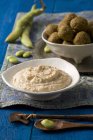 Falafel with broad beans and chickpeas with hummus — Stock Photo