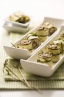 Rolled courgette slices with a tuna — Stock Photo