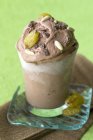 Chocolate ice cream with dried fruit — Stock Photo