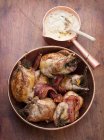 Top view of stuffed partridges wrapped in bacon — Stock Photo