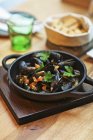 Grilled mussels with parsley — Stock Photo