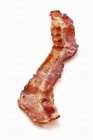 Fried bacon rasher — Stock Photo