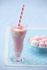 Strawberry milkshake in glass — Stock Photo