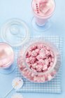 Jar of pink and white sweets — Stock Photo