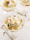 Closeup view of Trifle with peanuts in glasses — Stock Photo