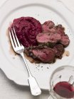 Venison laying on plate — Stock Photo