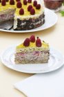 Raspberry cheesecake on plates — Stock Photo
