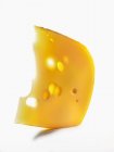 Keil aus Käse mit Löchern — Stockfoto