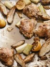 Chicken with artichokes and lemons — Stock Photo