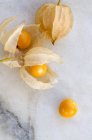 Ripe physalis berries on table — Stock Photo