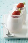Natural yoghurt in glass — Stock Photo