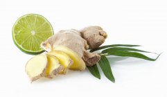 Fresh Ginger root and lime — Stock Photo