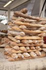 Stacked freshly baked baguettes — Stock Photo
