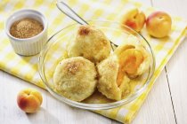 Apricot dumplings with buttery breadcrumb — Stock Photo