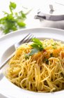 Capellini pasta with lemon — Stock Photo
