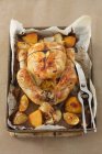 Chicken baked with lemon and onion — Stock Photo