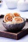 Puff pastry whirls with ham — Stock Photo