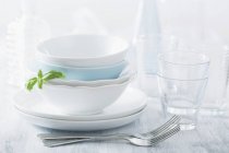 Stacked dinner bowls and plates — Stock Photo