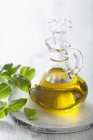 Carafe with olive oil — Stock Photo