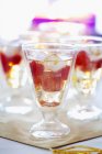 Sparkling wine with diced strawberries — Stock Photo