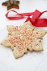 Cookie with colored sugar sprinkles — Stock Photo