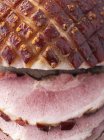 Partly sliced Roasted crackling pork — Stock Photo