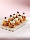 Muffins with cream cheese — Stock Photo