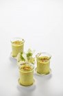 Fennel souffl in three jars on white surface — Stock Photo