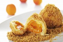 Apricot dumplings with breadcrumbs — Stock Photo