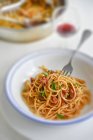 Linguine pasta with tomato sauce — Stock Photo