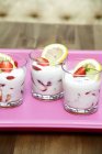 Yoghurt with fresh strawberries — Stock Photo