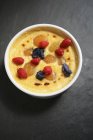Baked custard with berries — Stock Photo