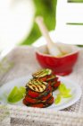 Vegetable stacks of grilled aubergine slices and tomatoes  in tray — Stock Photo