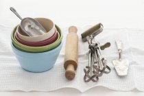 Baking utensils over towel — Stock Photo